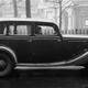The Ford V8 was the car of choice for moonshiners, although I doubt the woman behind the wheel had anything to do with that sort of fracas.